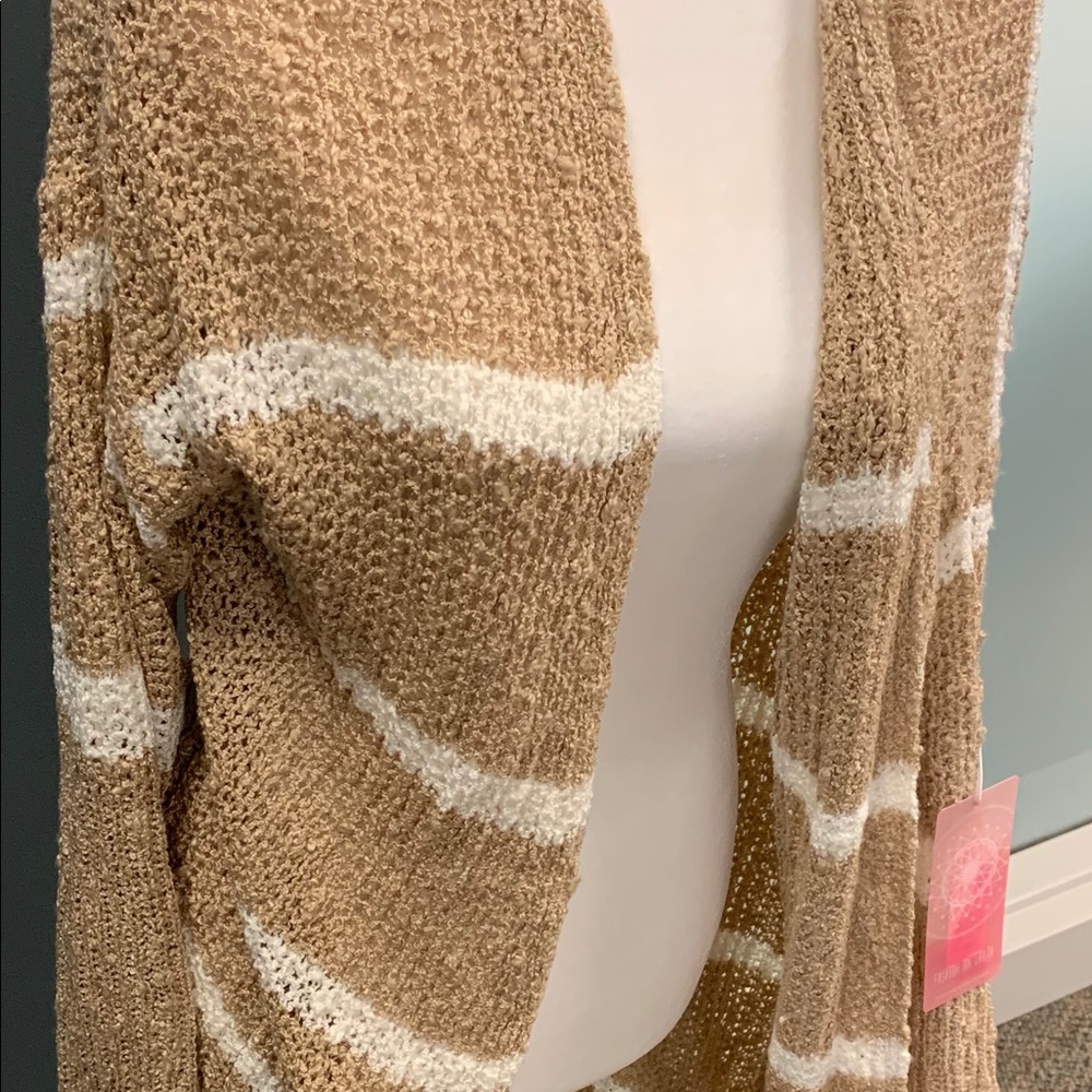 Long brown and white knit sweater
